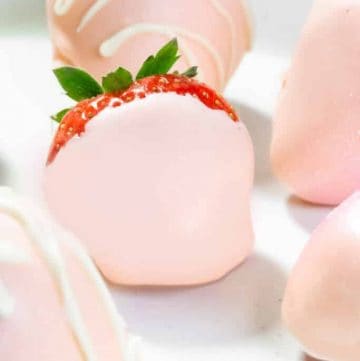 strawberries covered in pink chocolate