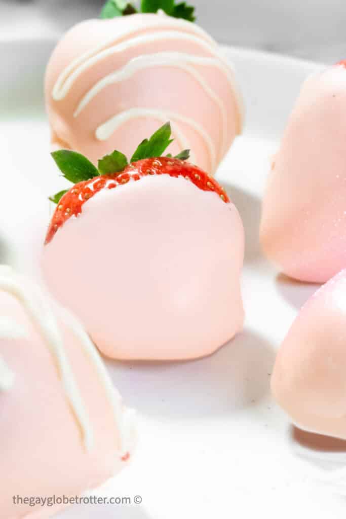 strawberries covered in pink chocolate