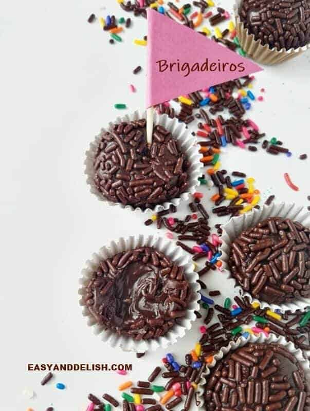 four chocolate brigadeiros with sprinkles