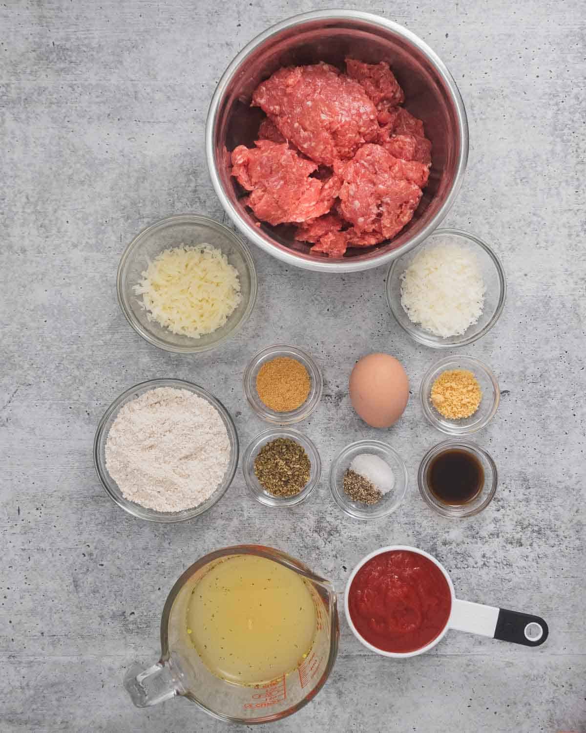 Portioned ingredients to make meatballs.