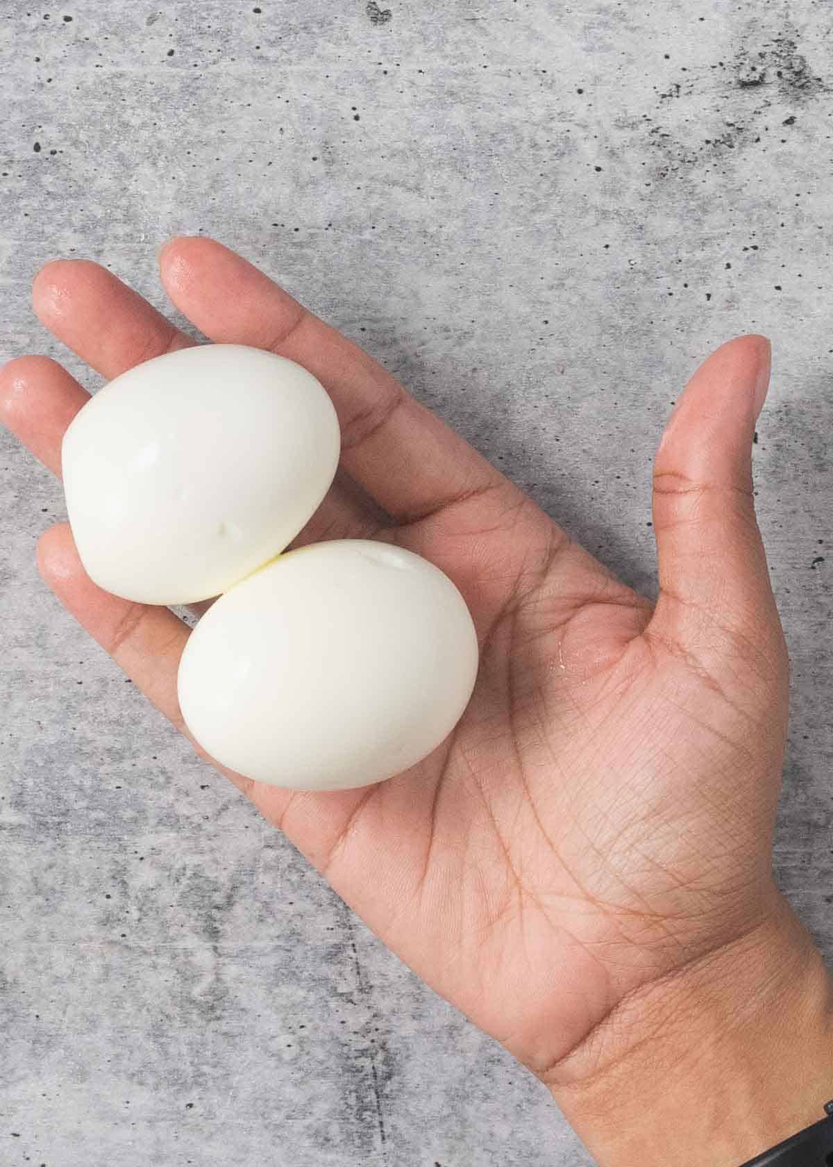 a top view of peeled hard boiled eggs.