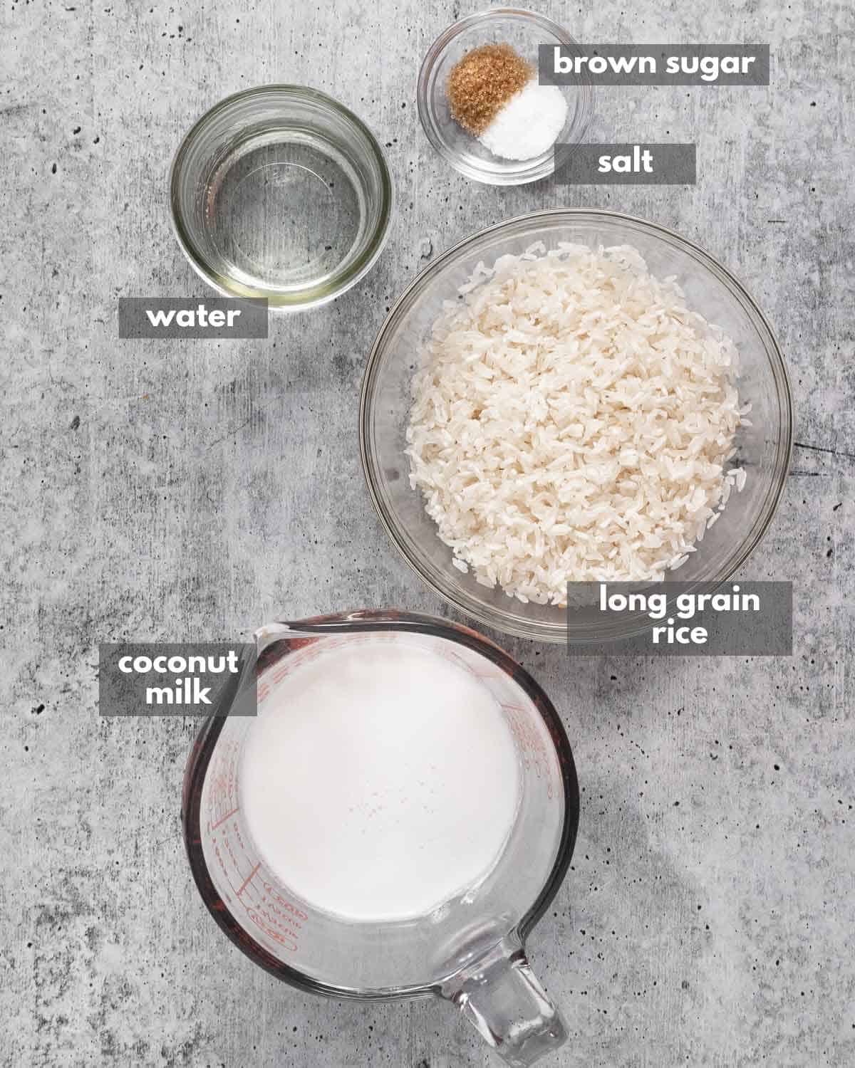 A top view of portioned ingredients to make coconut rice.