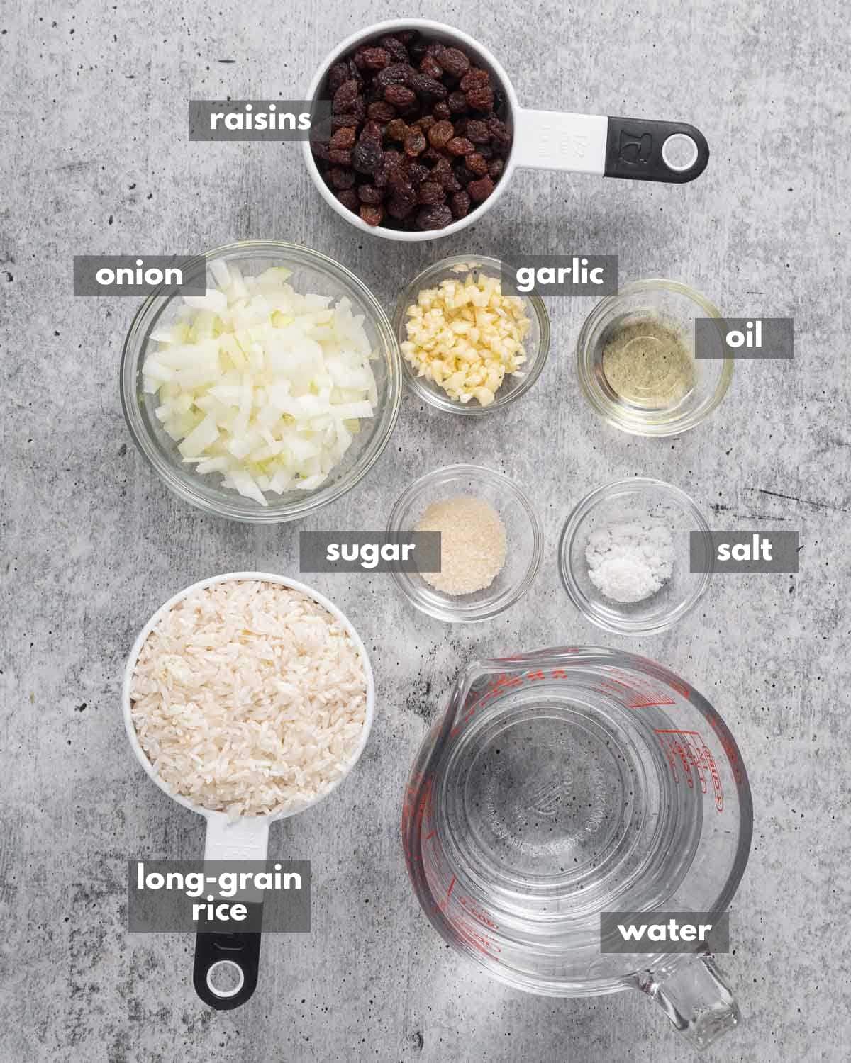 Ingredients portioned out for making rice with raisins.