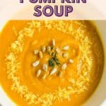 Pinterest pin, closeup bowl with pumpkin soup, and an overlay text that says roasted pumpkin soup.