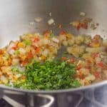 Cooked sofrito in a pan.